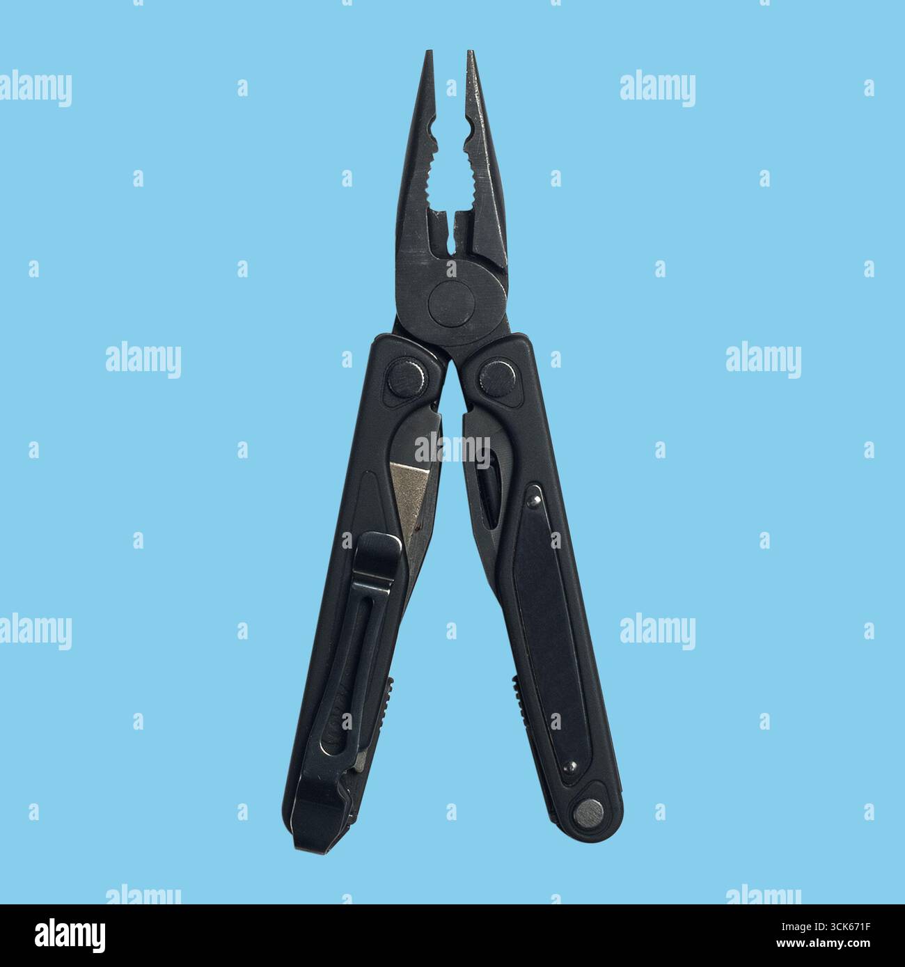A black multi-tool plier designed for various tasks, featuring gripping jaws and additional tools for convenience. Stock Photo