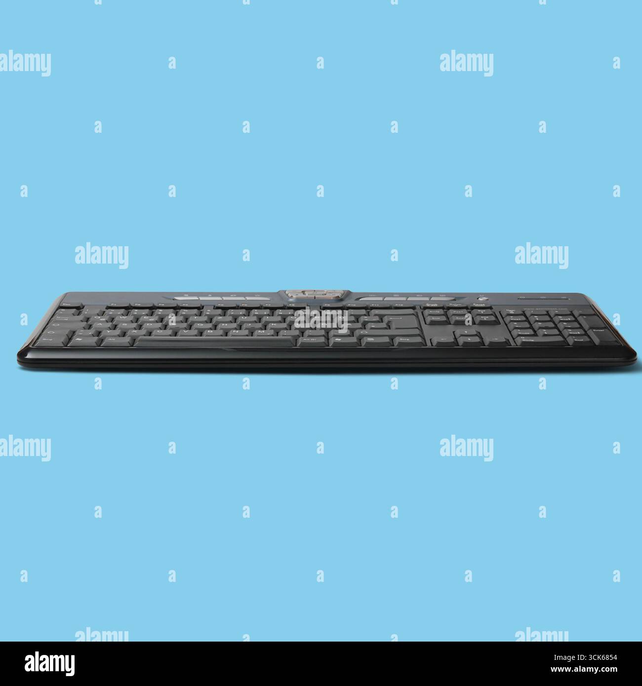 A sleek black keyboard designed for efficient typing and user interaction with computers. Stock Photo