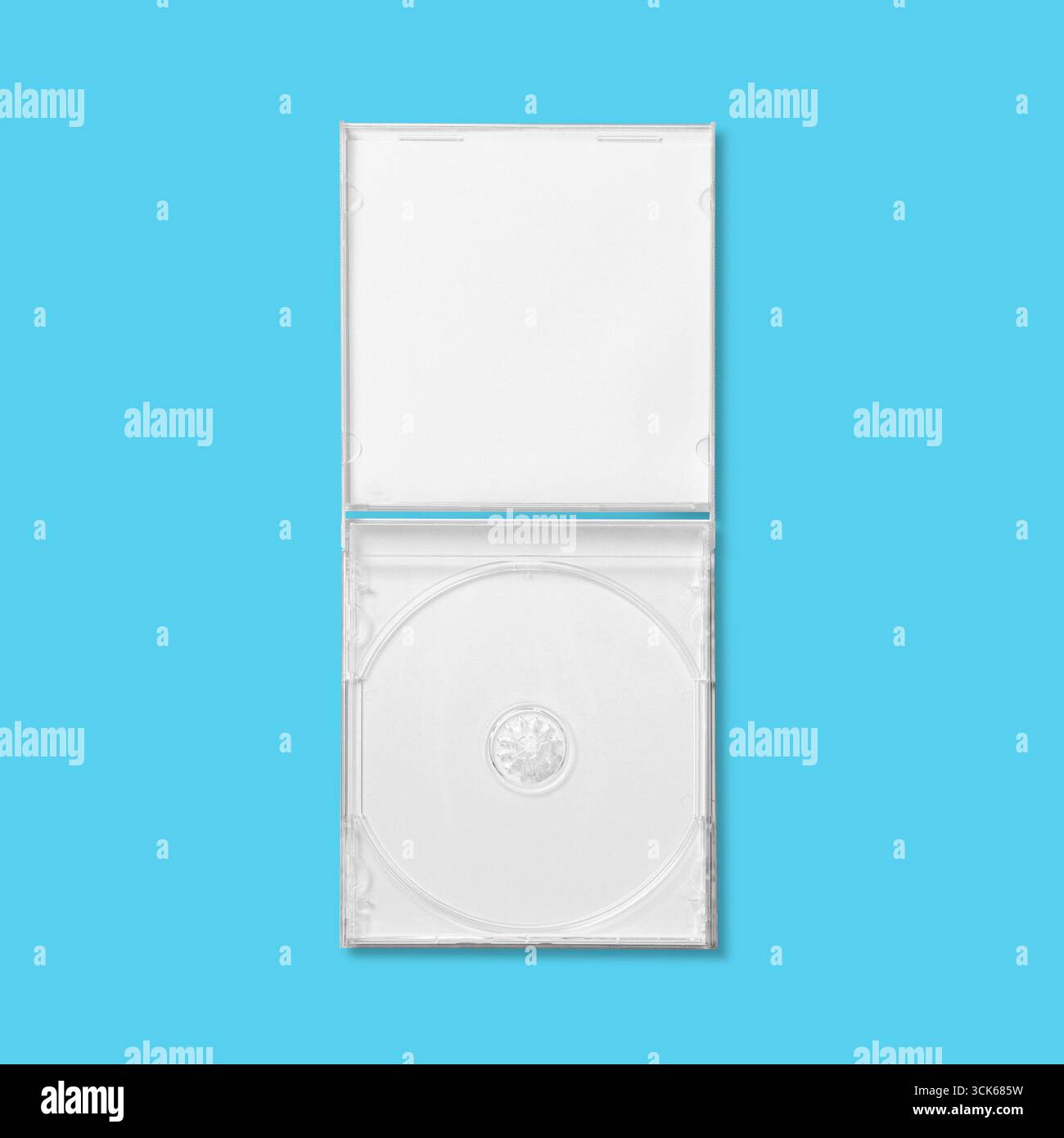 A transparent CD case with a disc holder, designed for storing compact discs securely. Stock Photo