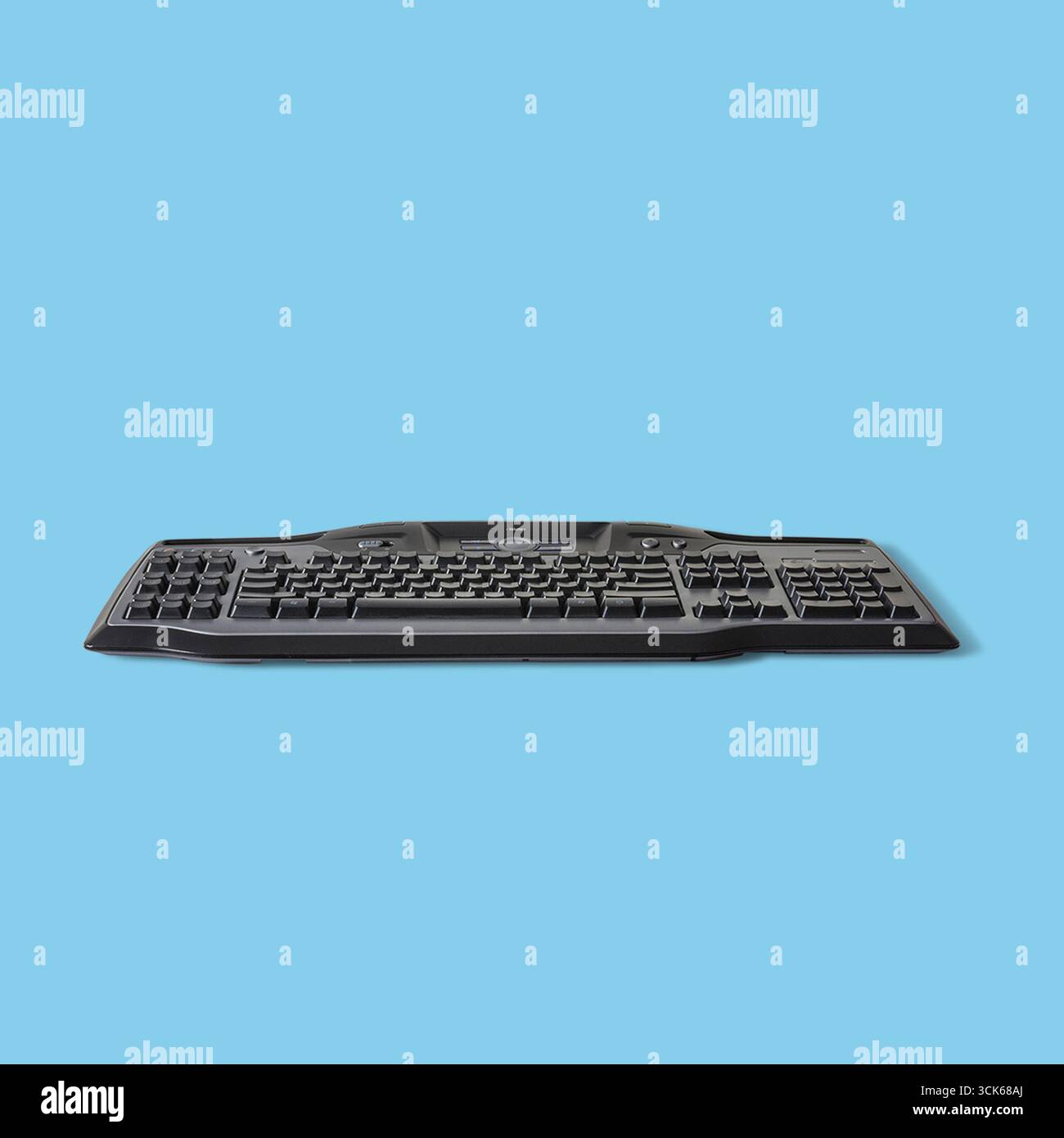 A sleek black computer keyboard designed for typing and data entry. Stock Photo