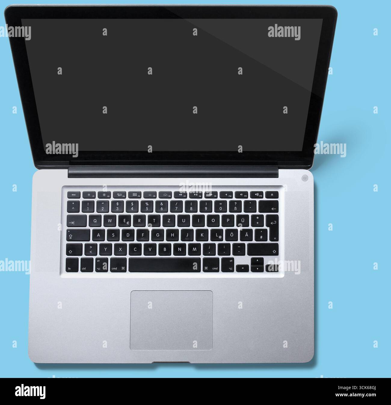 A sleek, open laptop displaying a blank screen, designed for various computing tasks. Stock Photo