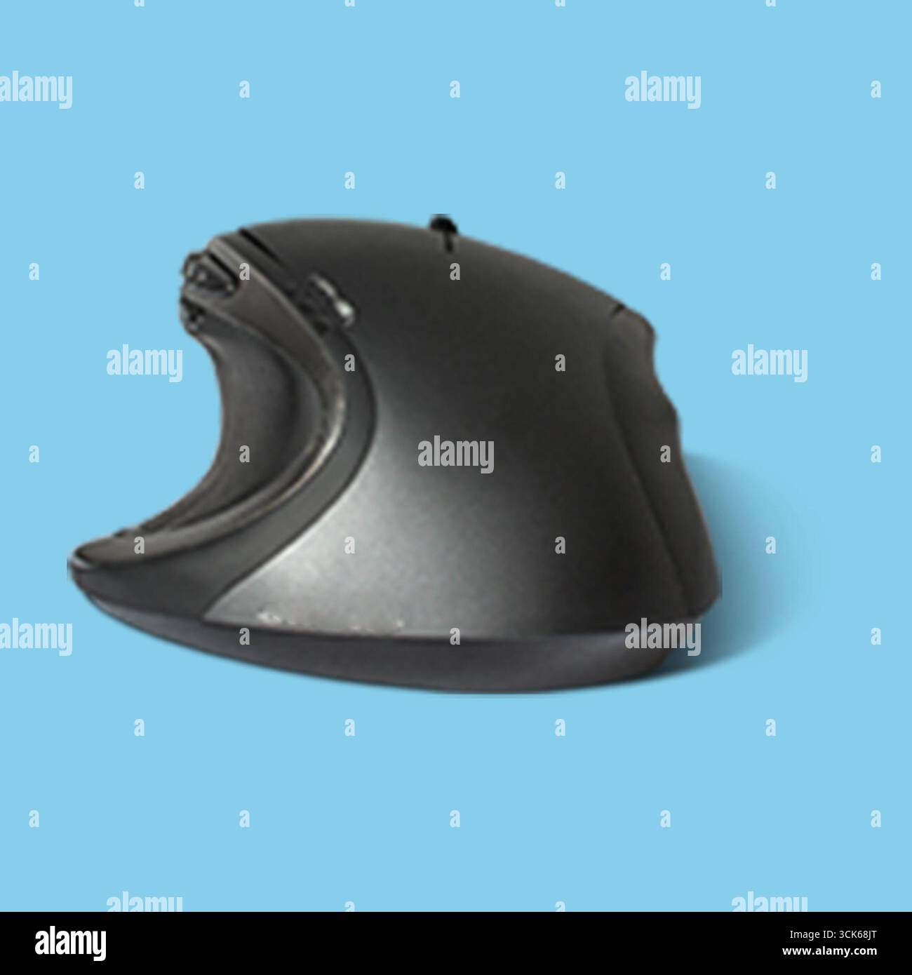 An ergonomic computer mouse designed for comfortable use. Stock Photo