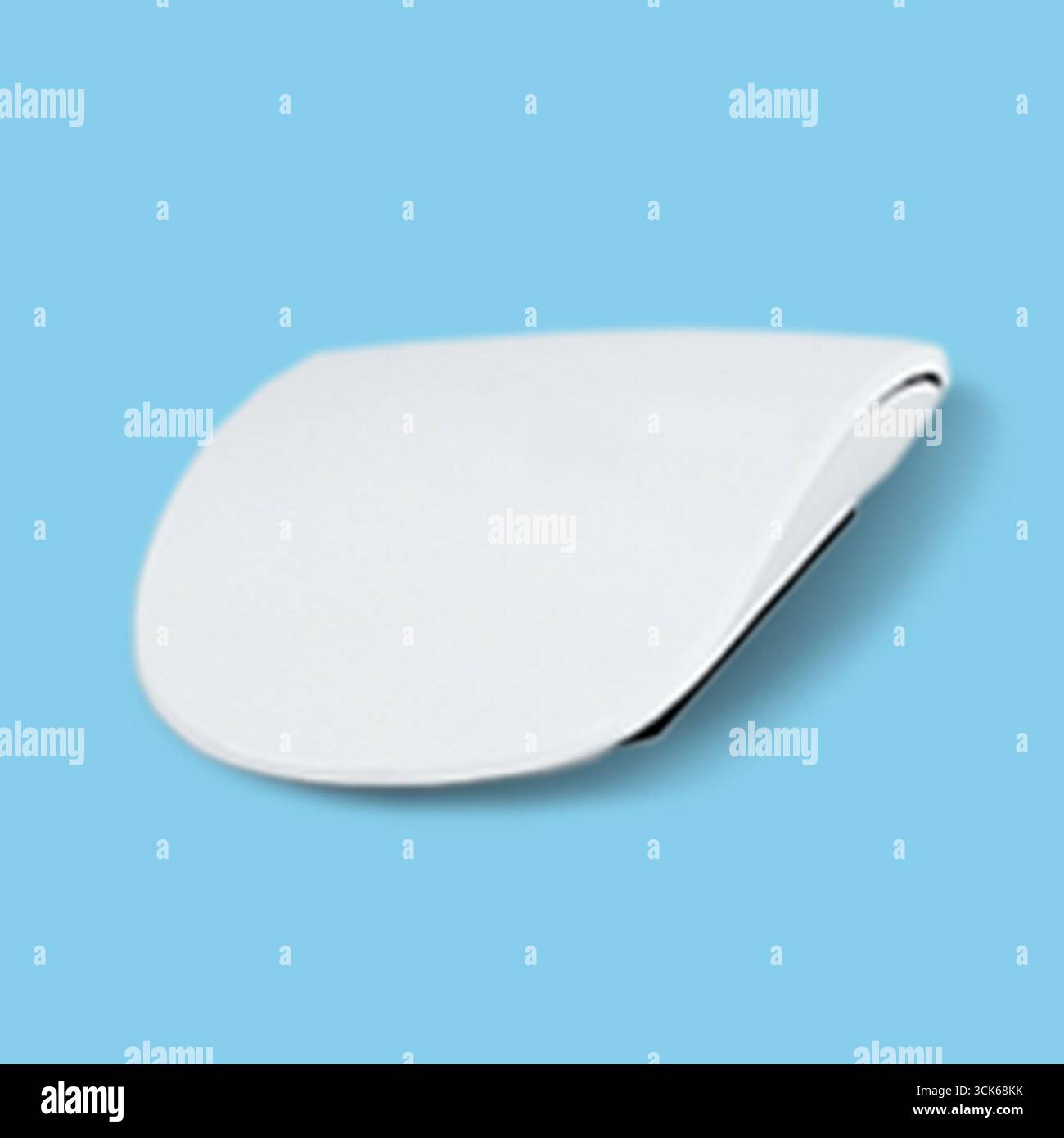 A sleek, modern computer mouse designed for ergonomic use and smooth navigation. Stock Photo