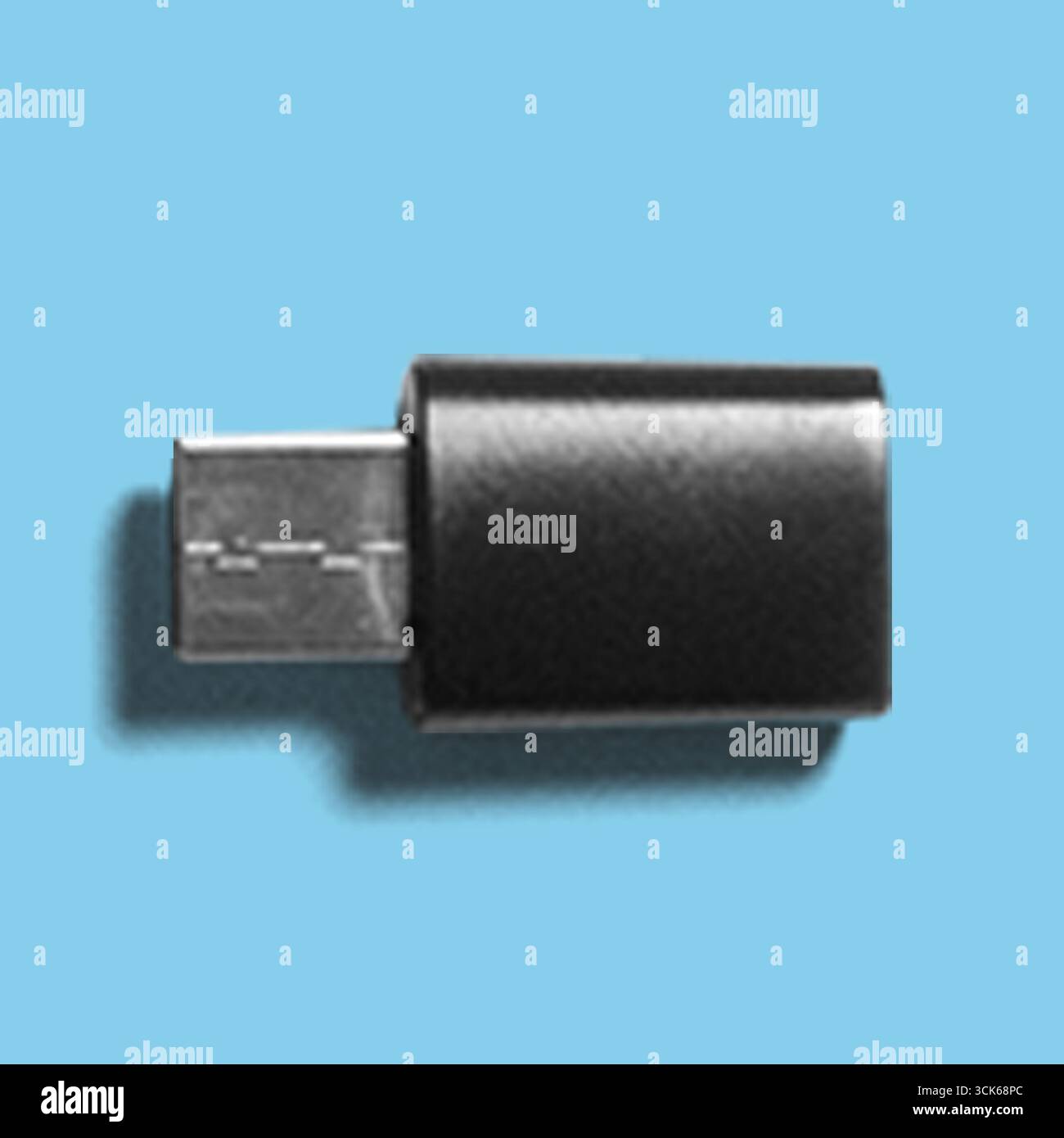 A black USB flash drive designed for data storage and transfer. Stock Photo