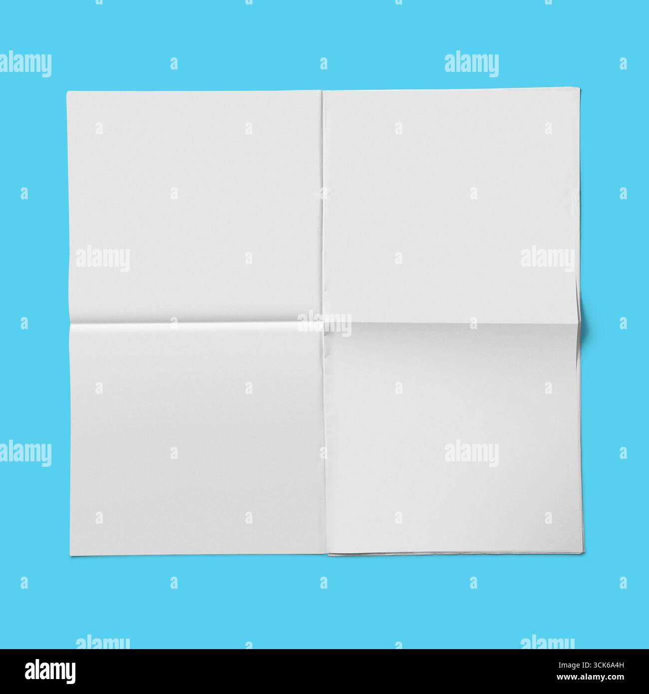 A blank, folded paper sheet, ready for notes or sketches. Stock Photo