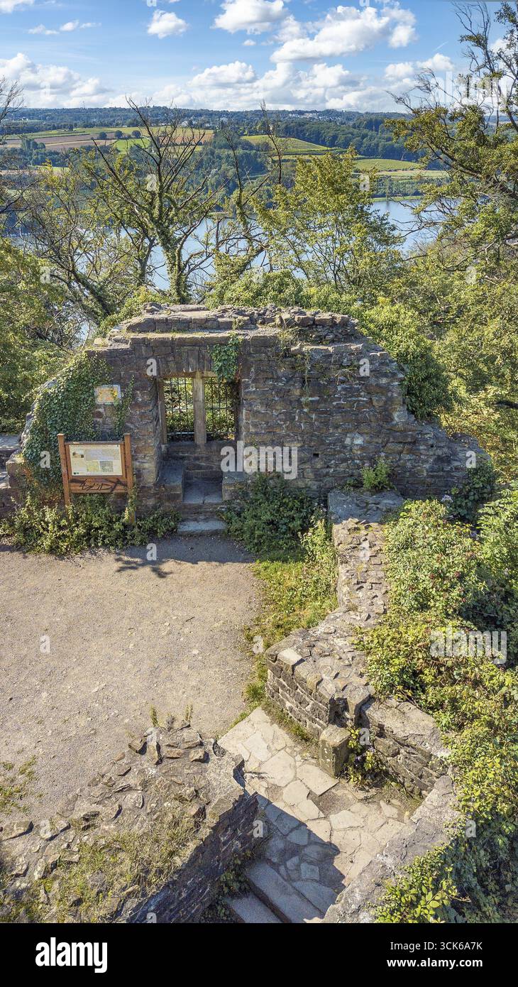 Bird's eye view of rest of wall with window niche part of ruins of Isenburg Castle, below old staircase to entrance of former residential building res Stock Photo