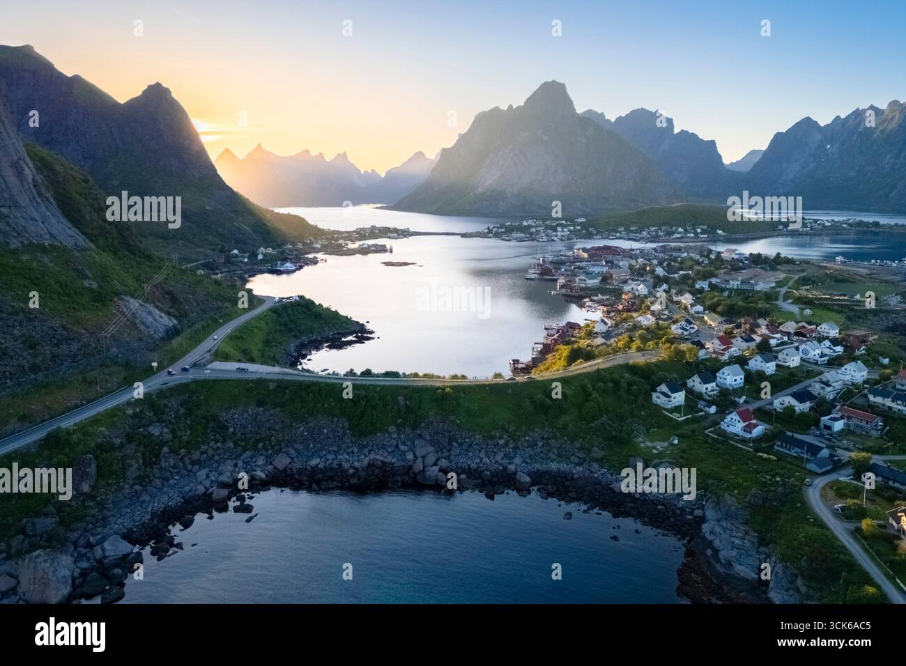 Aerial view of the Reine Bay and town in summer during sunset. Reine, Lofoten Islands, Norway. Stock Photo