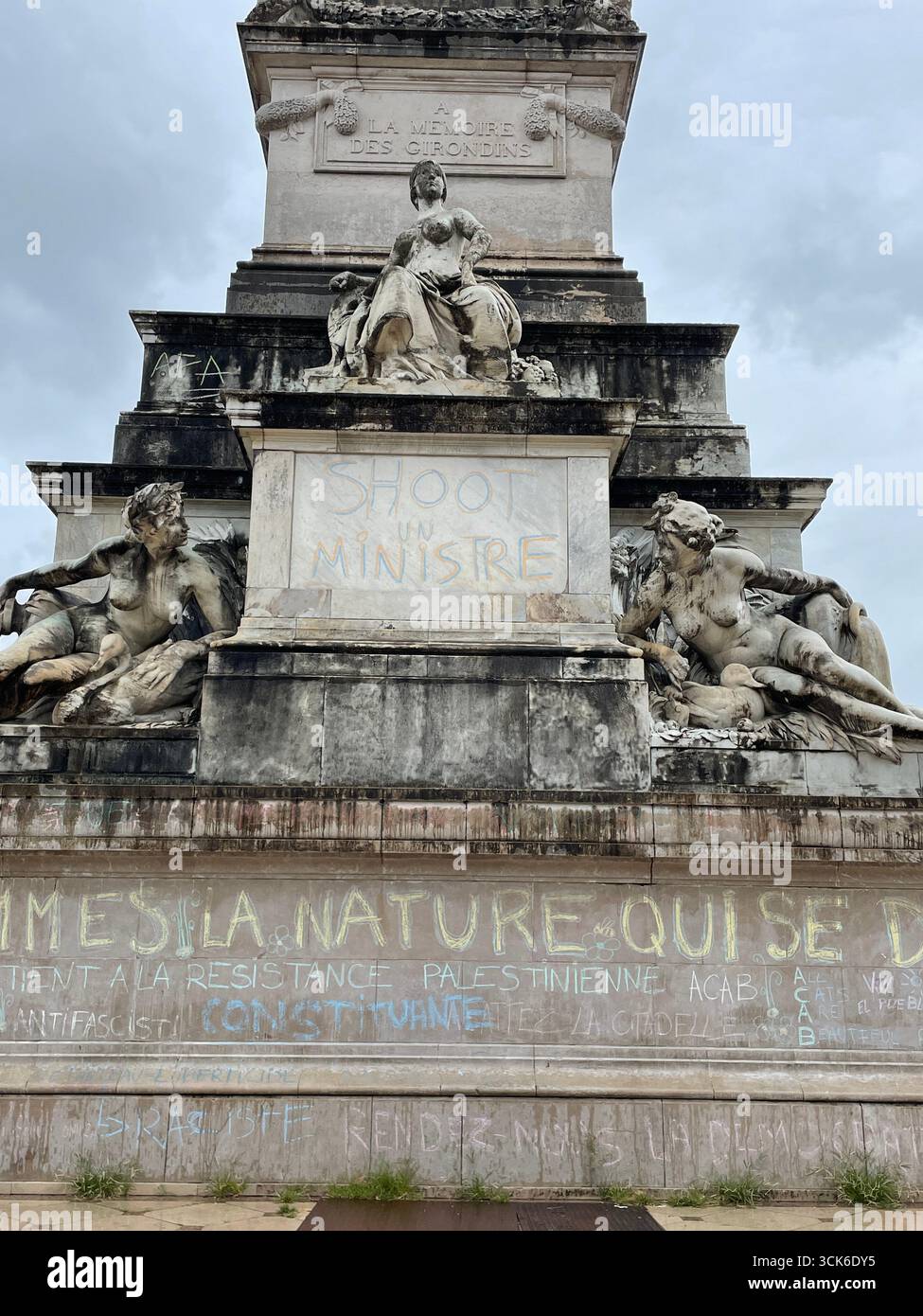 'SHOOT A MINISTER' Inscriptions on the Girondins monument in Bordeaux made by protesters from the 'Block Everything' movement on September 10, 2025. - Smartphone Captured Stock Image