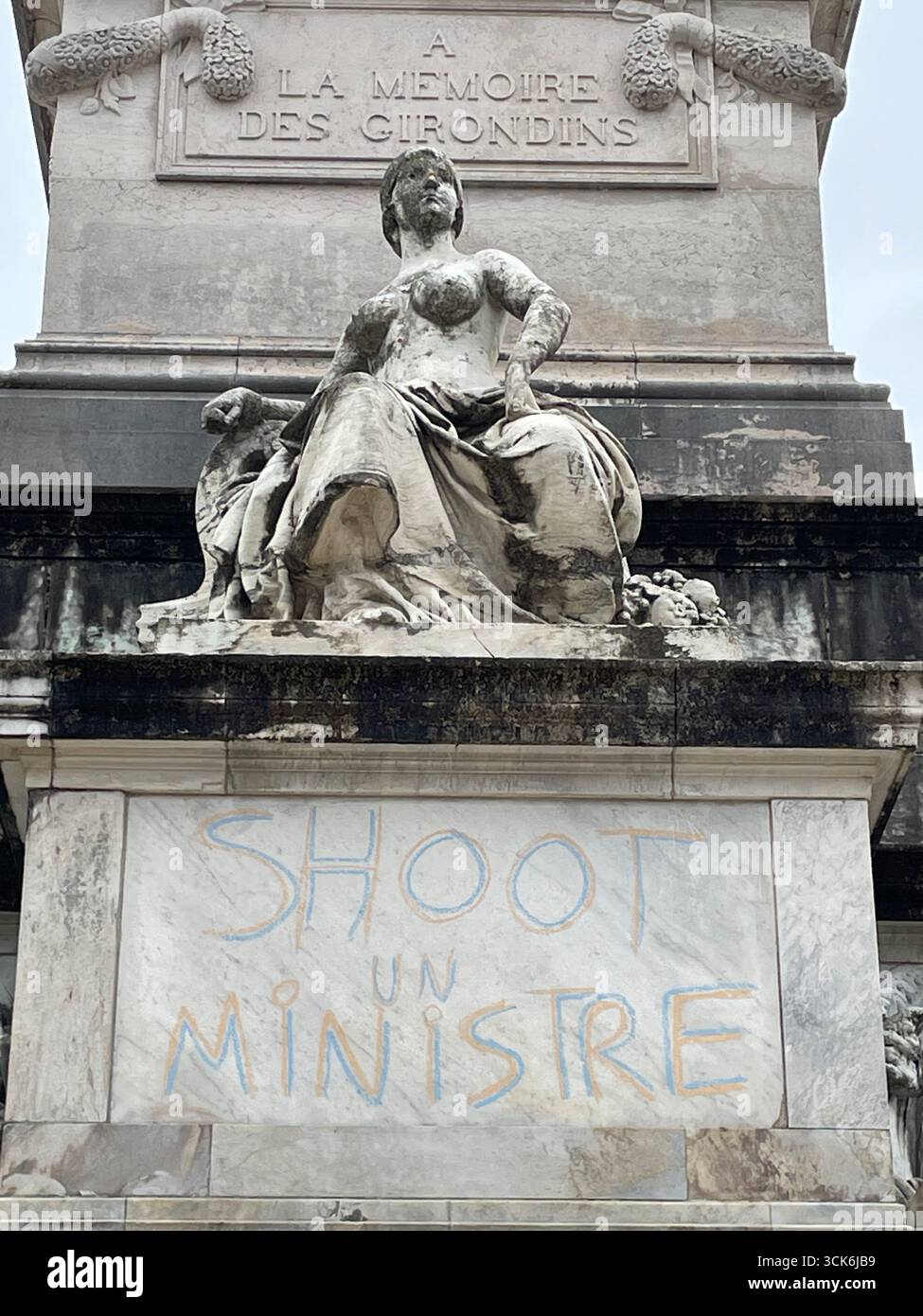 'SHOOT A MINISTER' Inscriptions on the Girondins monument in Bordeaux made by protesters from the 'Block Everything' movement on September 10, 2025. - Smartphone Captured Stock Image