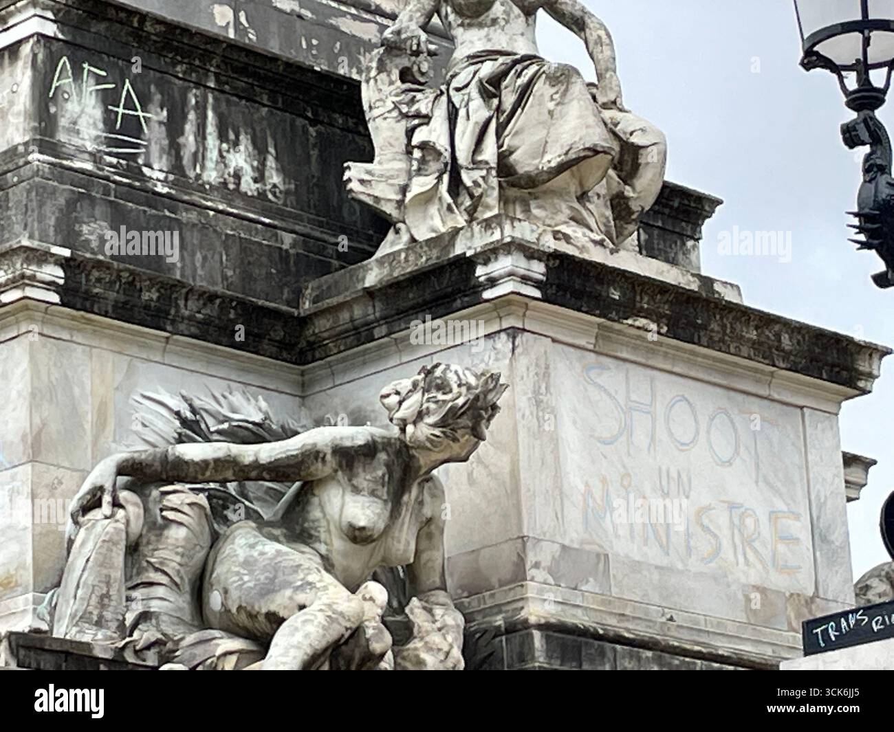 'SHOOT A MINISTER' Inscriptions on the Girondins monument in Bordeaux made by protesters from the 'Block Everything' movement on September 10, 2025. - Smartphone Captured Stock Image