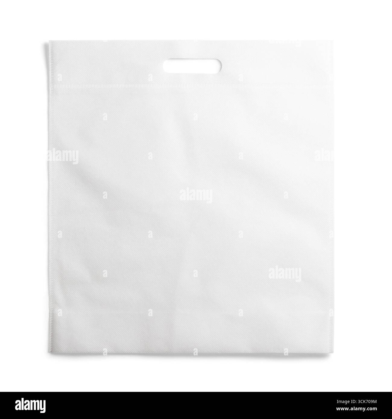 A plain white shopping bag with a handle, suitable for carrying items. Stock Photo