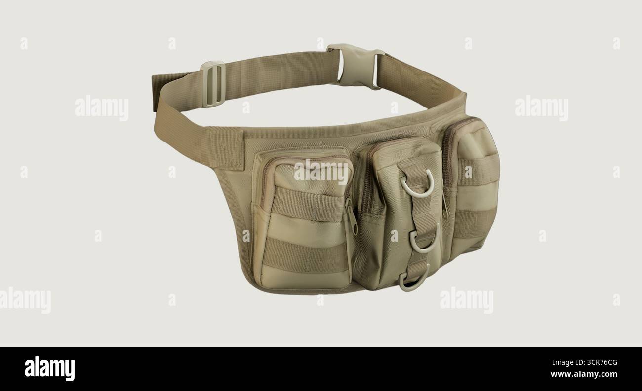A tactical waist bag designed for carrying gear and essentials, featuring multiple pockets and a secure strap. Stock Photo