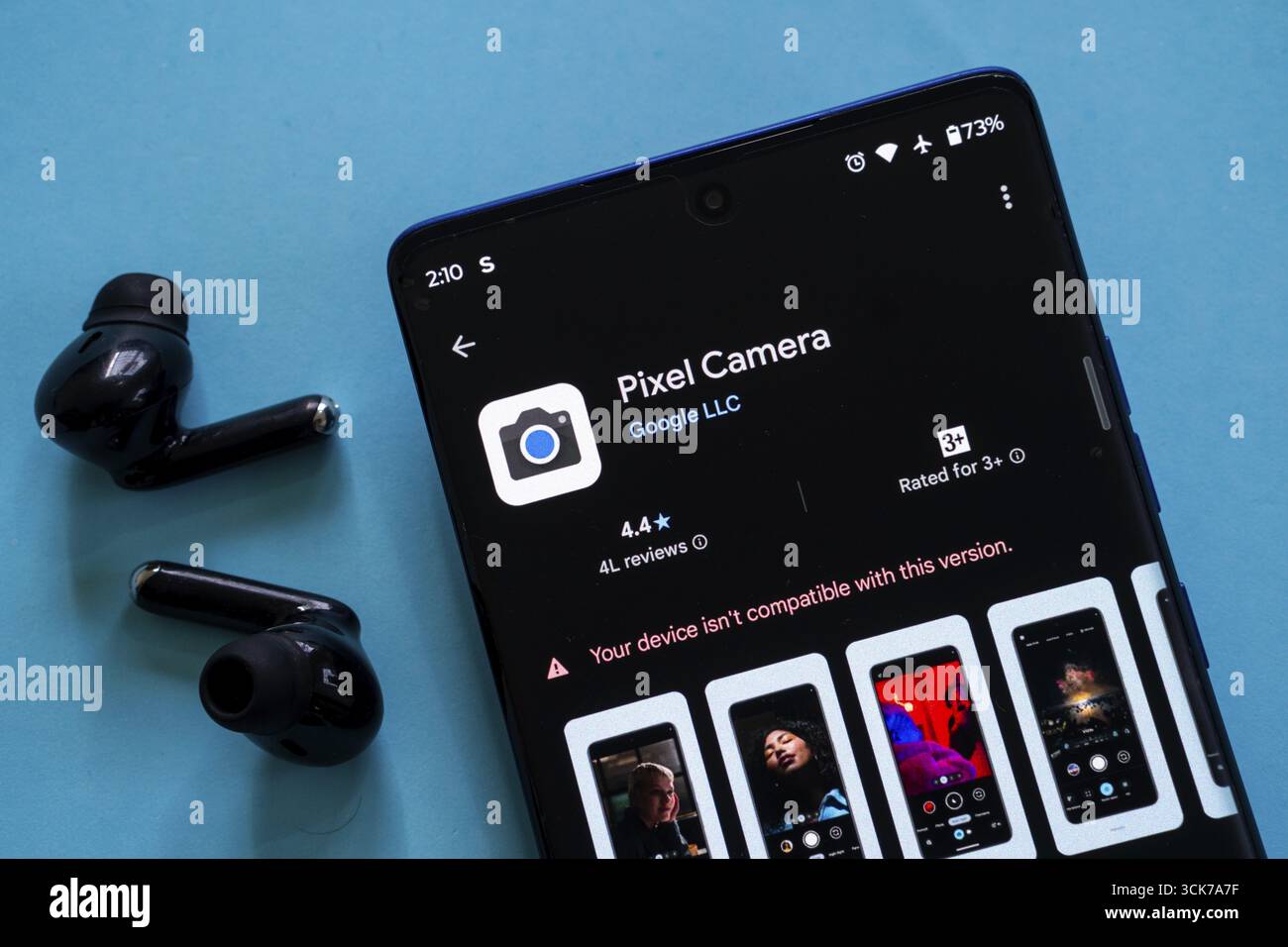 A smartphone screen featuring the Pixel Camera app interface and ...