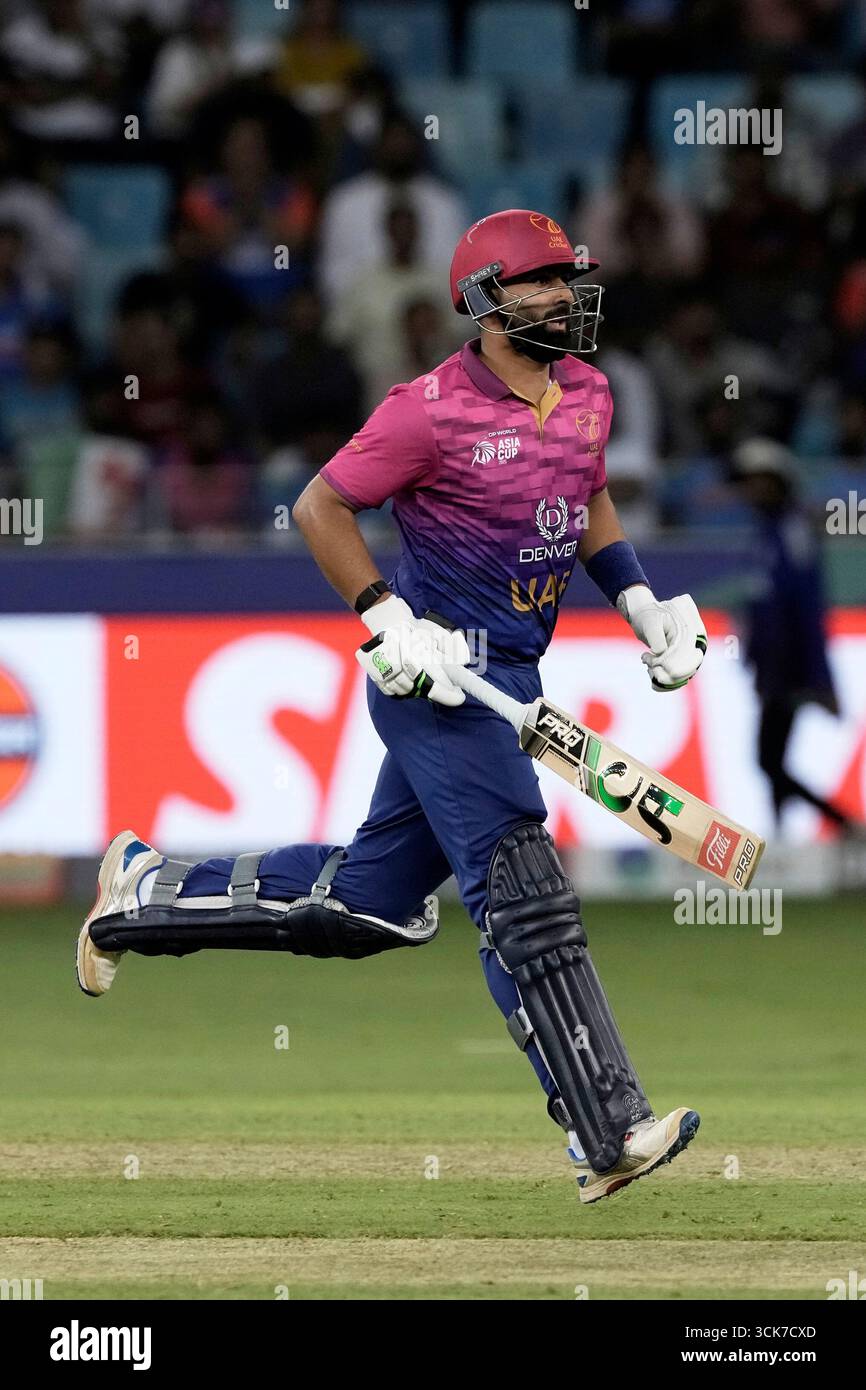 United Arab Emirates's captain Muhammad Waseem run between the wickets ...
