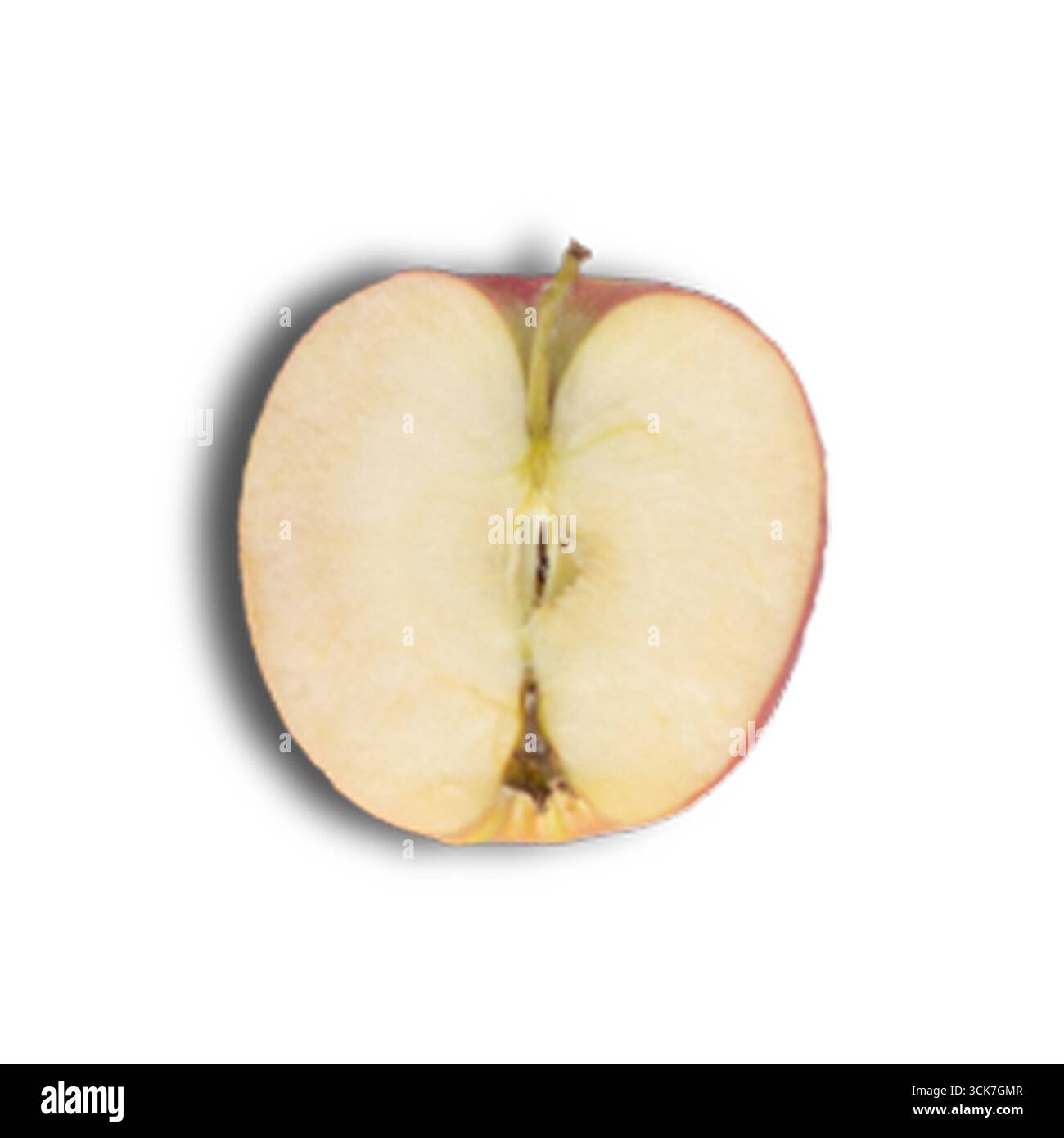 A cross-section of a red apple, showcasing its inner texture and seeds ...