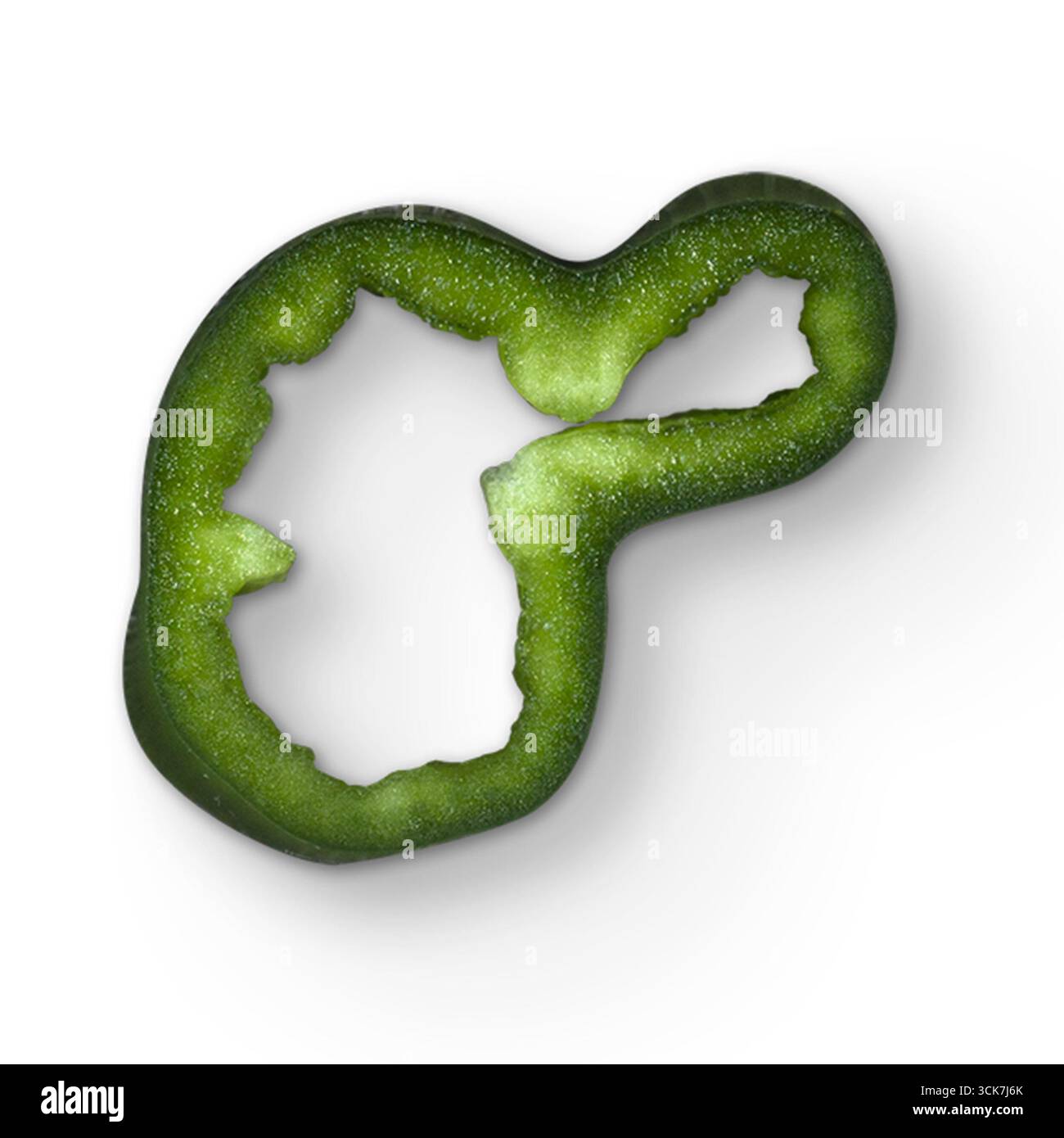 A sliced green bell pepper showcasing its unique shape and texture ...