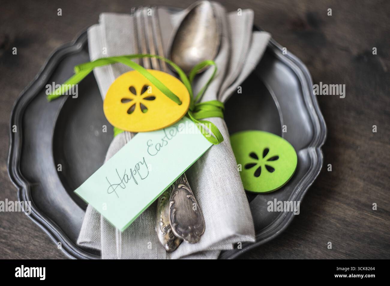 Festive easter table setting with colored eggs and easter bunny concept with copyspace Stock Photo