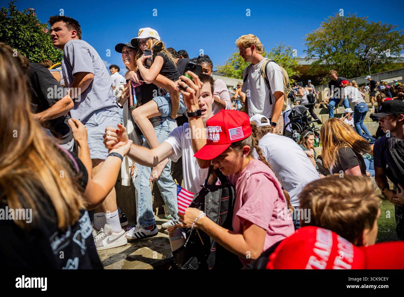 The crowd reacts after Charlie Kirk, the CEO and co-founder of the ...