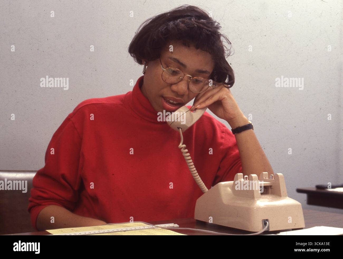 Young woman working a phone bank for Texas Governor race with Ann Richards.  ©1992 Stock Photo