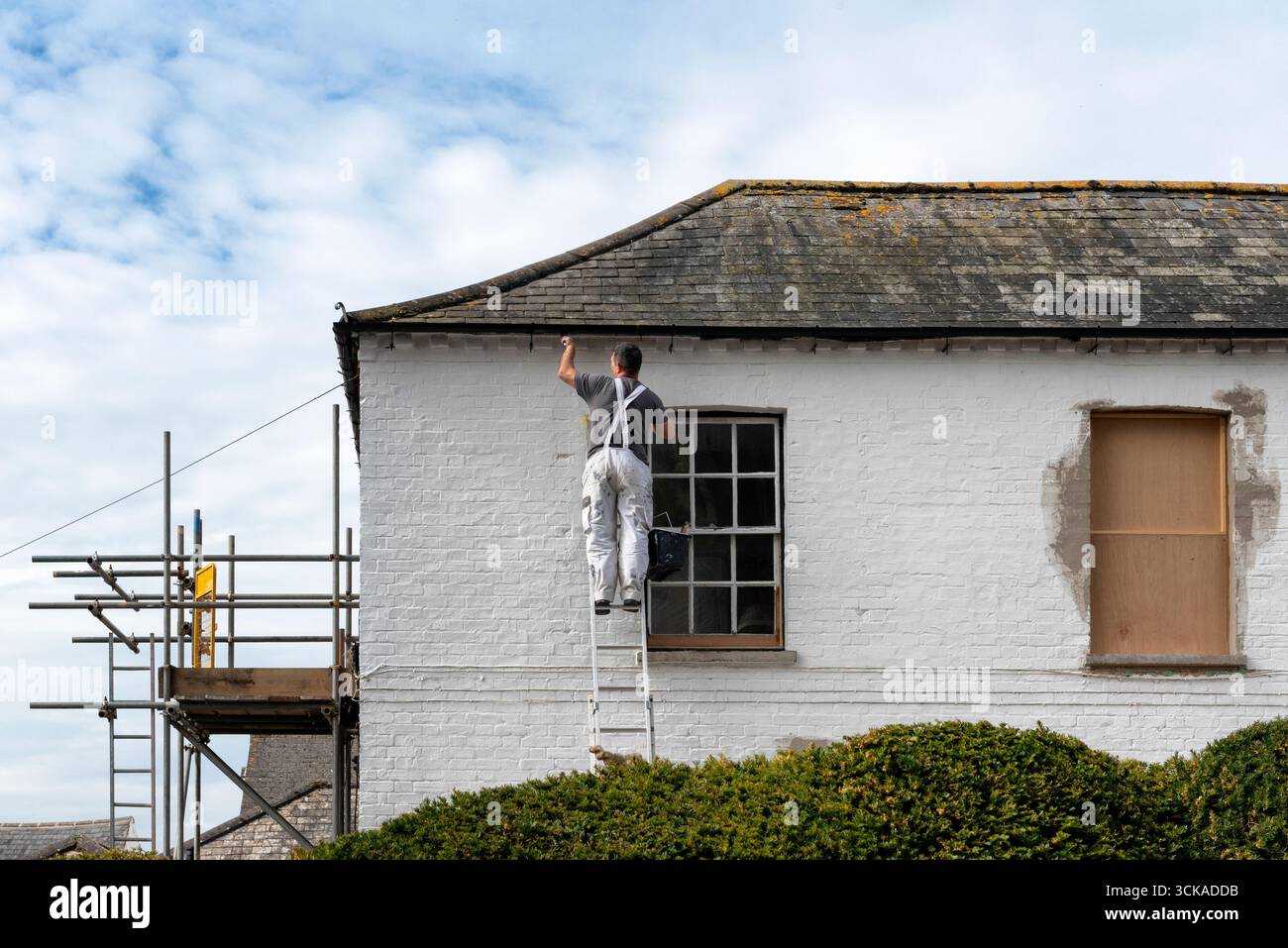 Man painting old house hi-res stock photography and images - Alamy