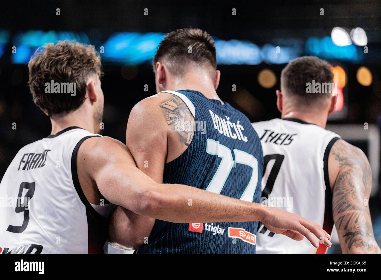 Luka Doncic (C) of Slovenia and Franz Wagner (L) seen in action during ...