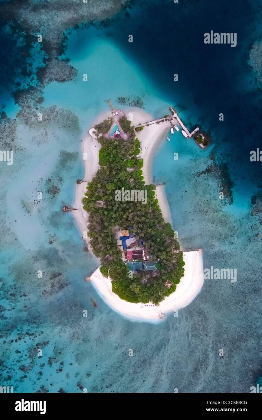 Aerial View of a Tropical Island Surrounded by Coral Reefs Stock Photo ...