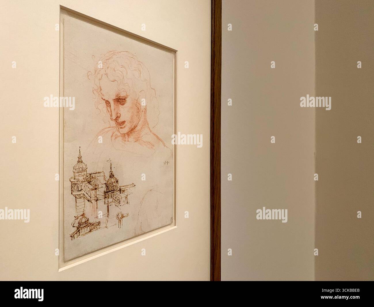 Louvre Museum exhibition: Architectural study, Apostle James the Greater in The Last Supper; Leonardo da Vinci, red chalk, pen & brown ink, 1494-1496 - Smartphone Captured Stock Image