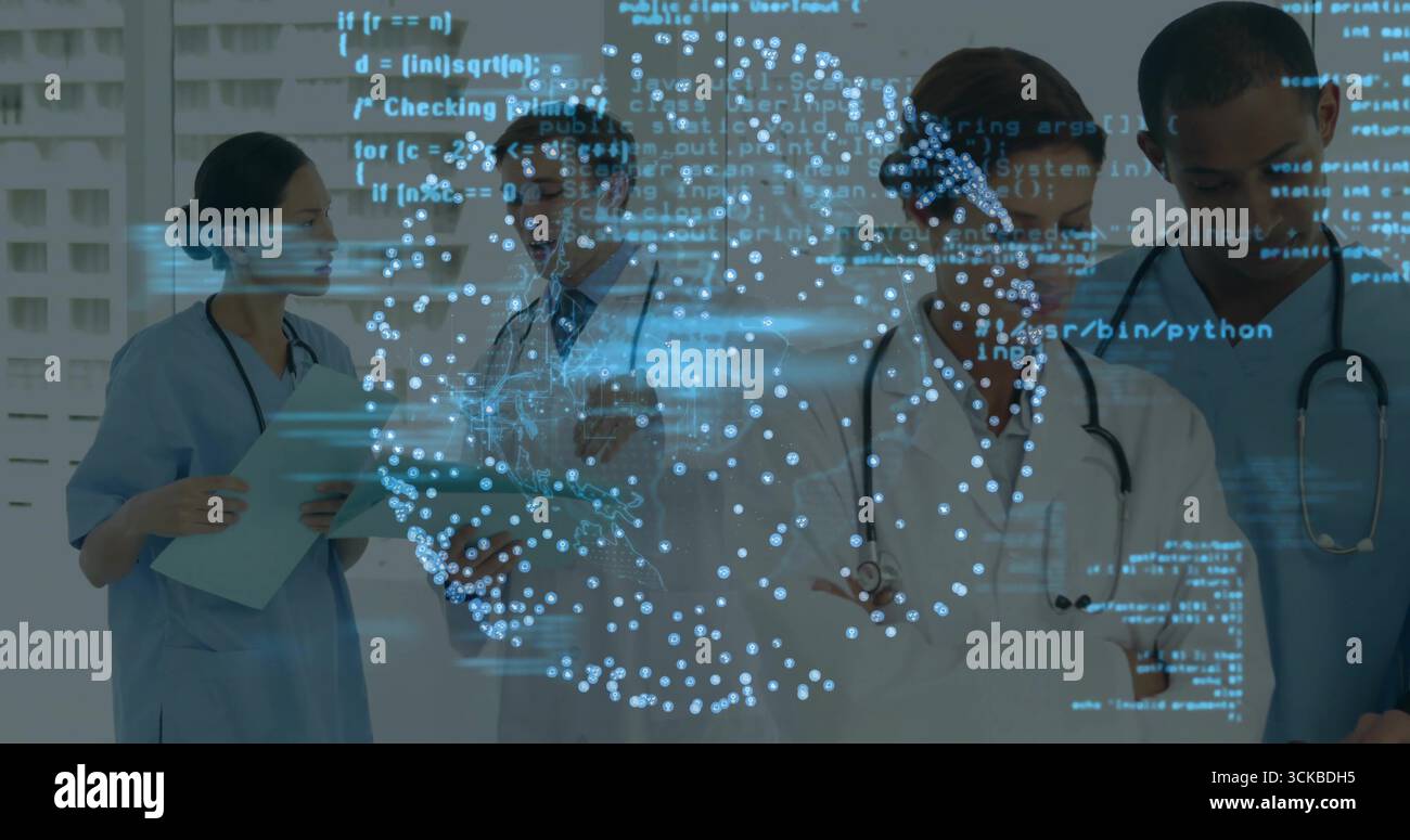 Reviewing healthcare team analyzing data in hospital corridor, with ...