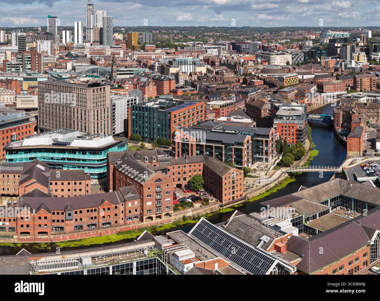 Aerial image of Leeds city centre, featuring River Aire, modern offices, and urban architecture in Yorkshire, England. Stock Photo