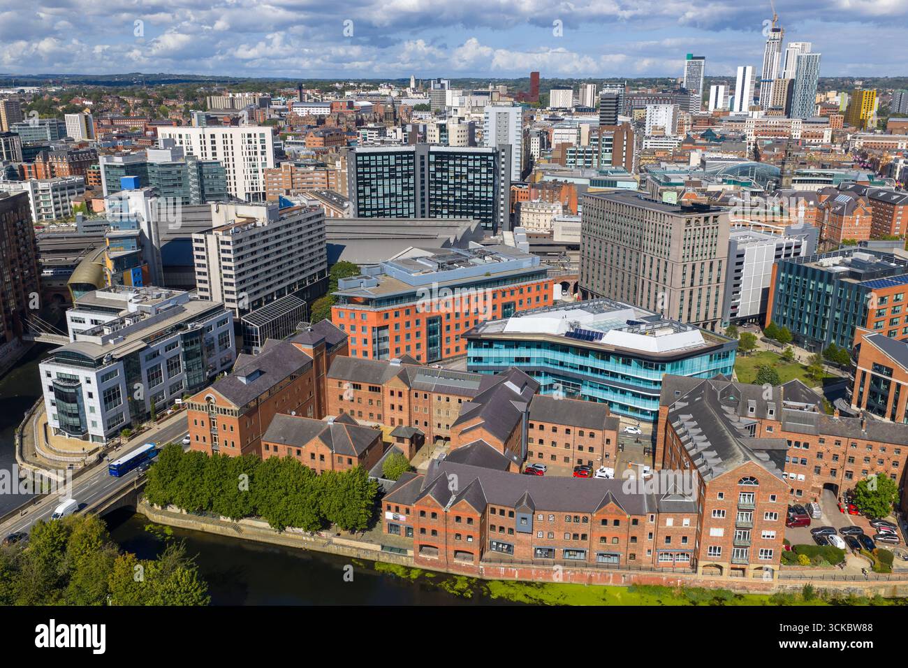 Aerial image of Leeds city centre, featuring River Aire, modern offices, and urban architecture in Yorkshire, England. Stock Photo