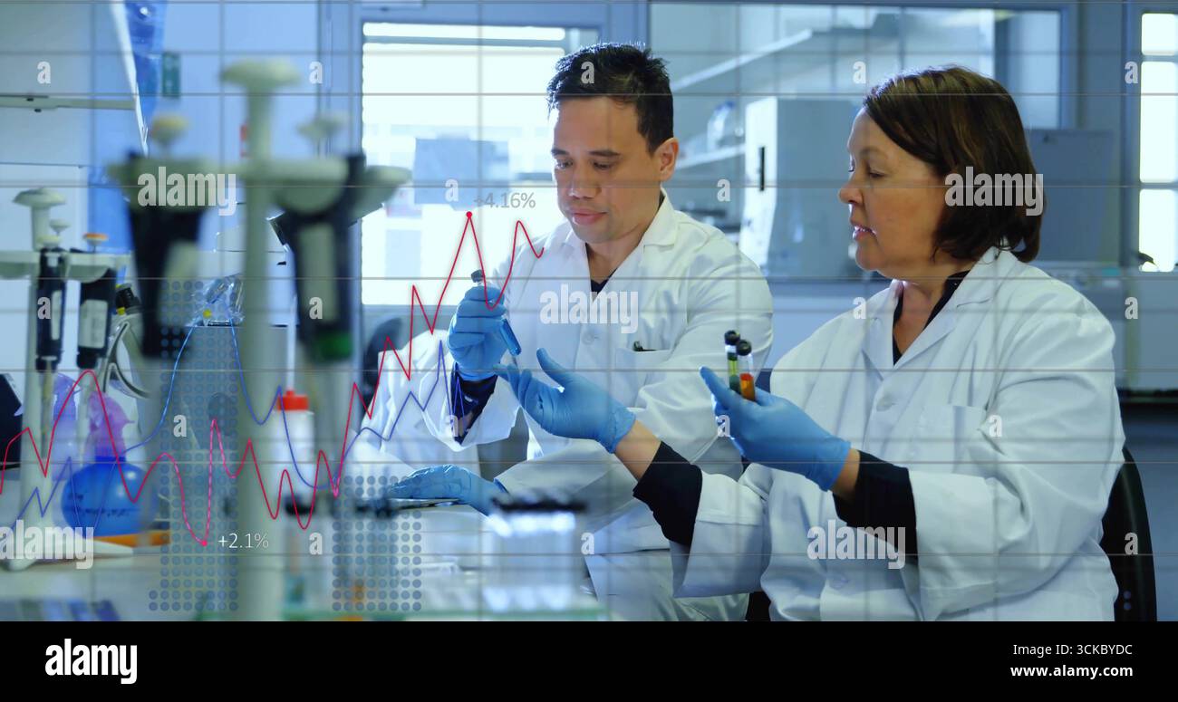 Lab Mentoring Transferring sample by mentor-mentee scientists using micropipette at ...