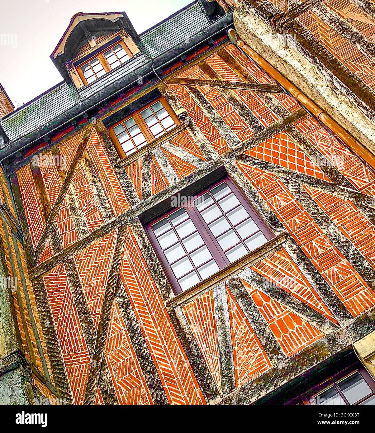 Decorative brick infill (replaced earlier plaster) in 16th century medieval timber-frame house - Place Plumereau, Tours, Indre-et-Loire (37), France. Stock Photo