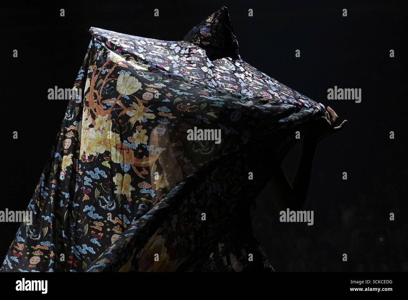 A model presents a creation from the Lijin collection by Rong He during ...
