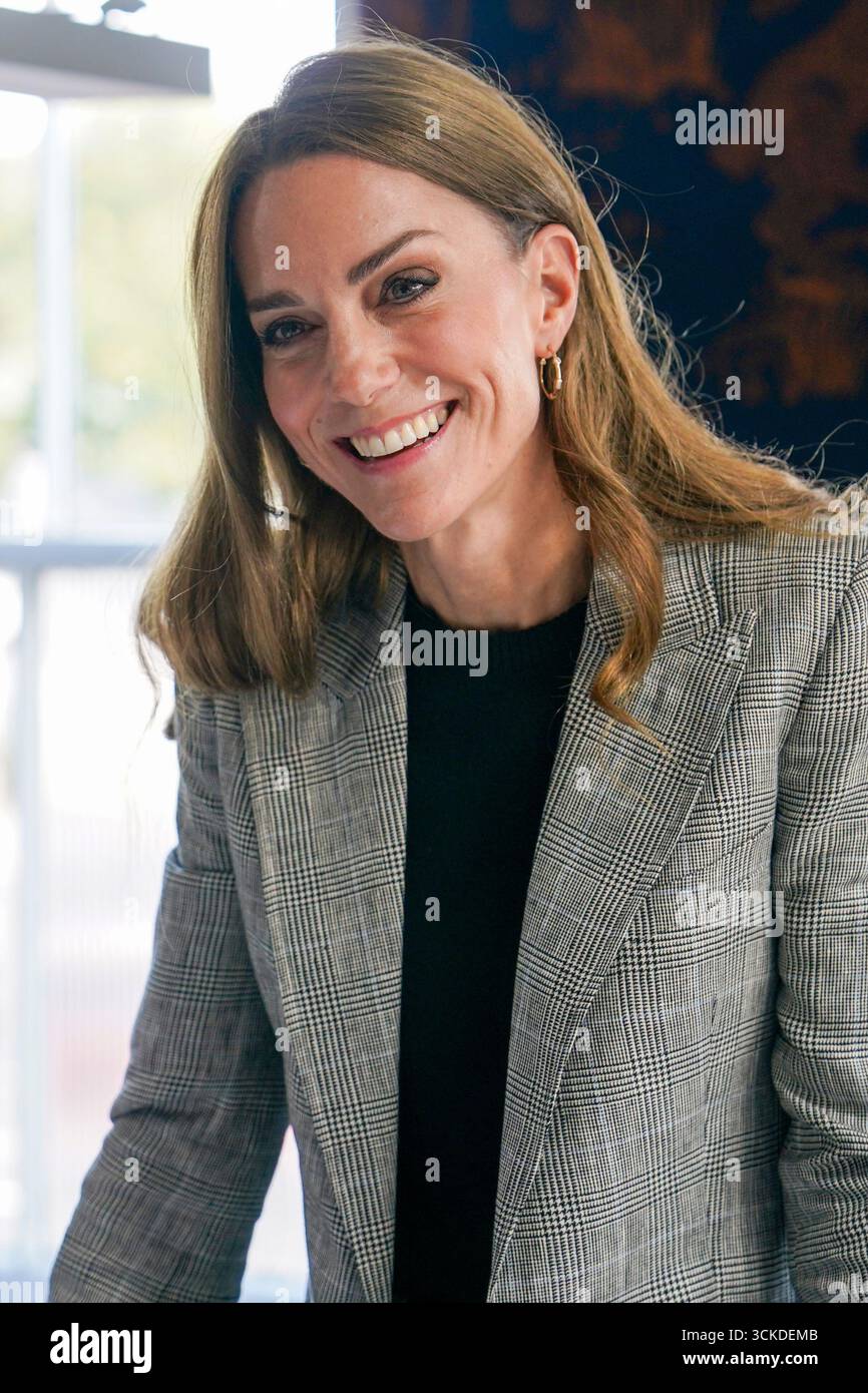 Britain's Kate, Princess of Wales, speaks as she visits Sudbury Silk ...