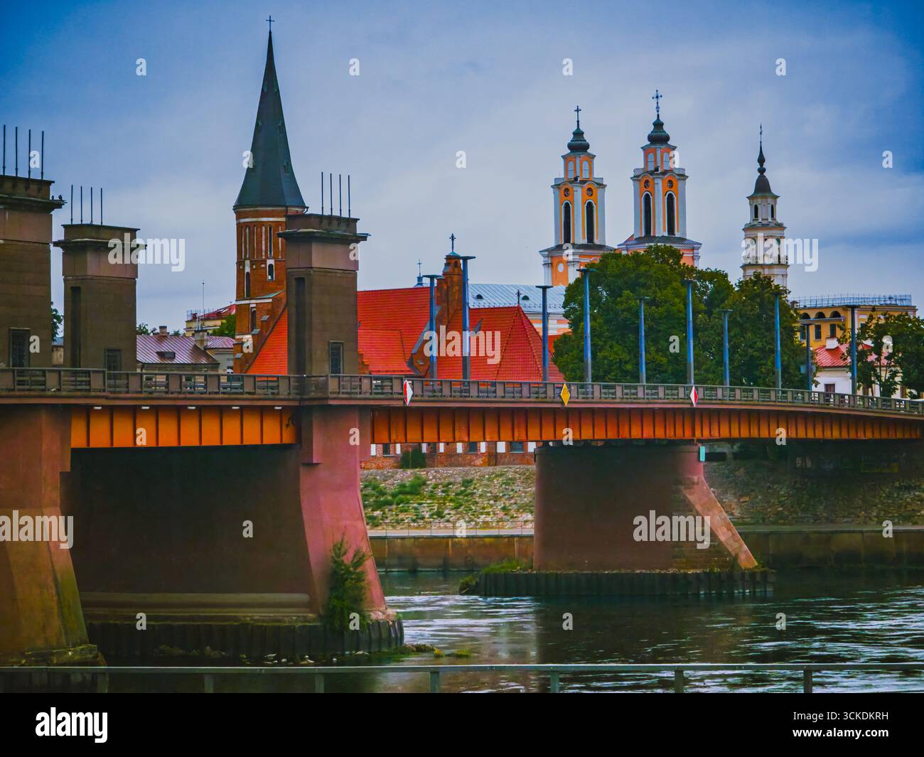 Kaunas cityscape with church towers and bridge over Neman River ...