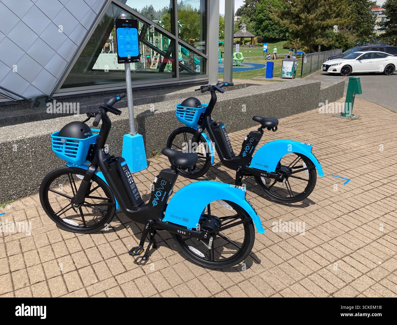 Evolve e-bike share in Comox, Vancouver Island, British Columbia, Canada - Smartphone Captured Stock Image