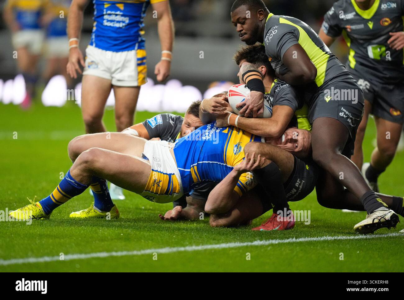 Leeds Rhinos' Mikolaj Oledzki is prevented from scoring a try during ...