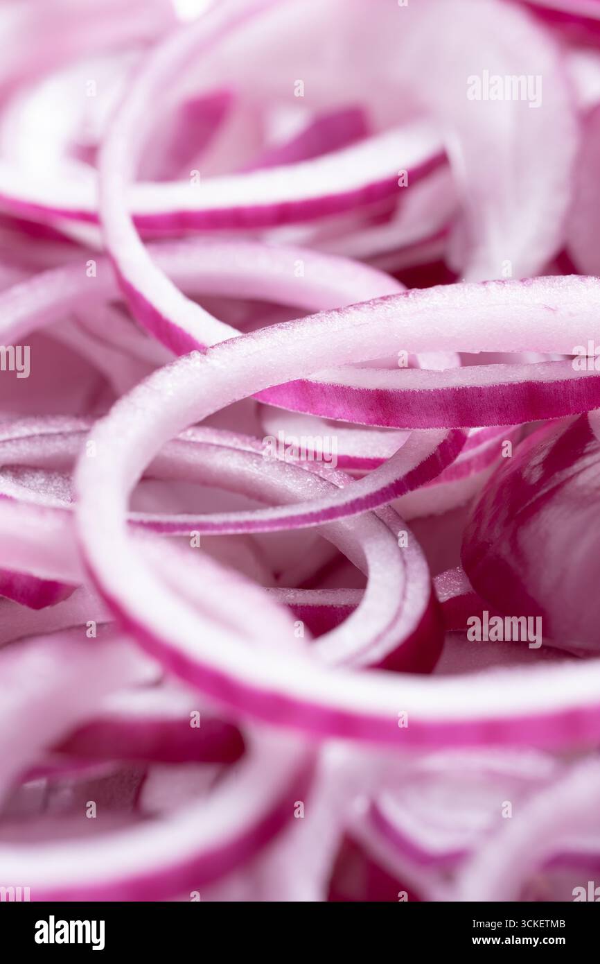 Sliced red onion on white background Stock Photo