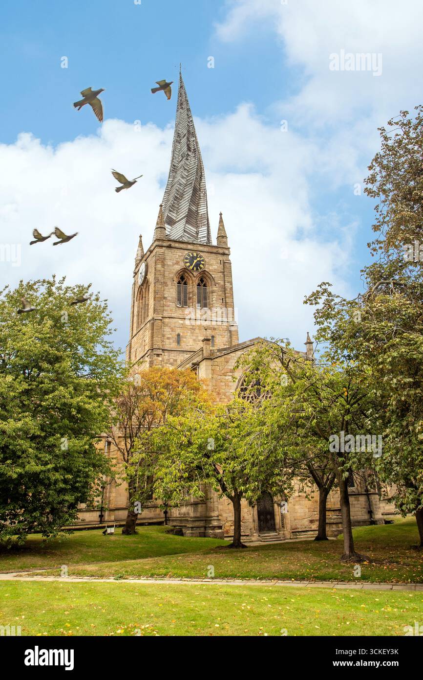 The parish Church of St Mary and All Saints, with its twisted crooked spire in the Derbyshire market town of Chesterfield, England Stock Photo