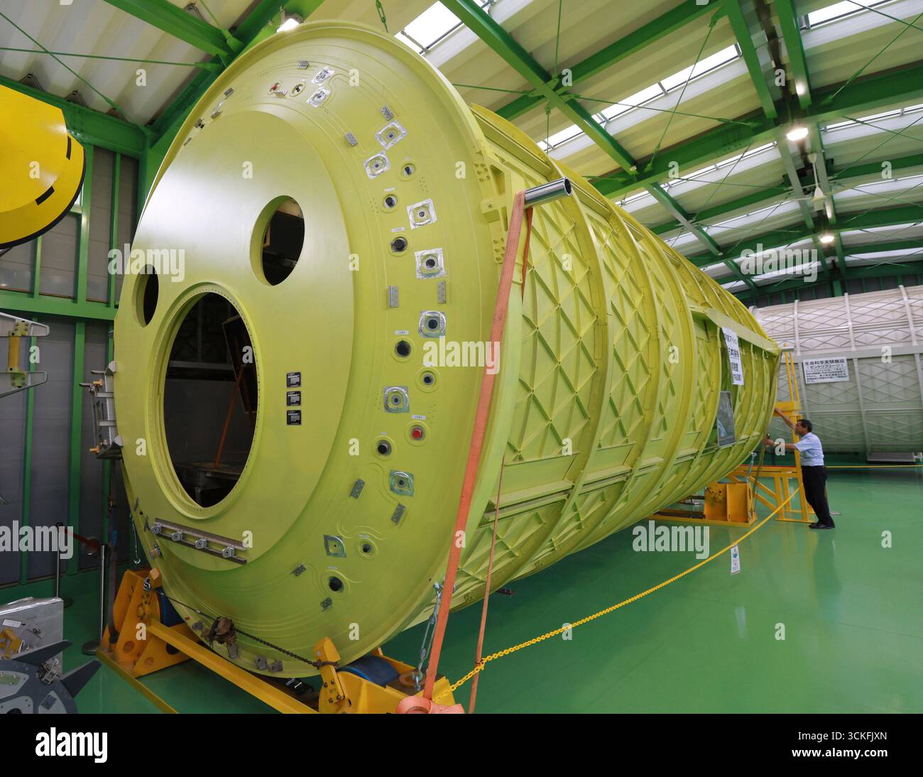 A photo shows items related to the "Kibo" Japanese Experiment Module ...