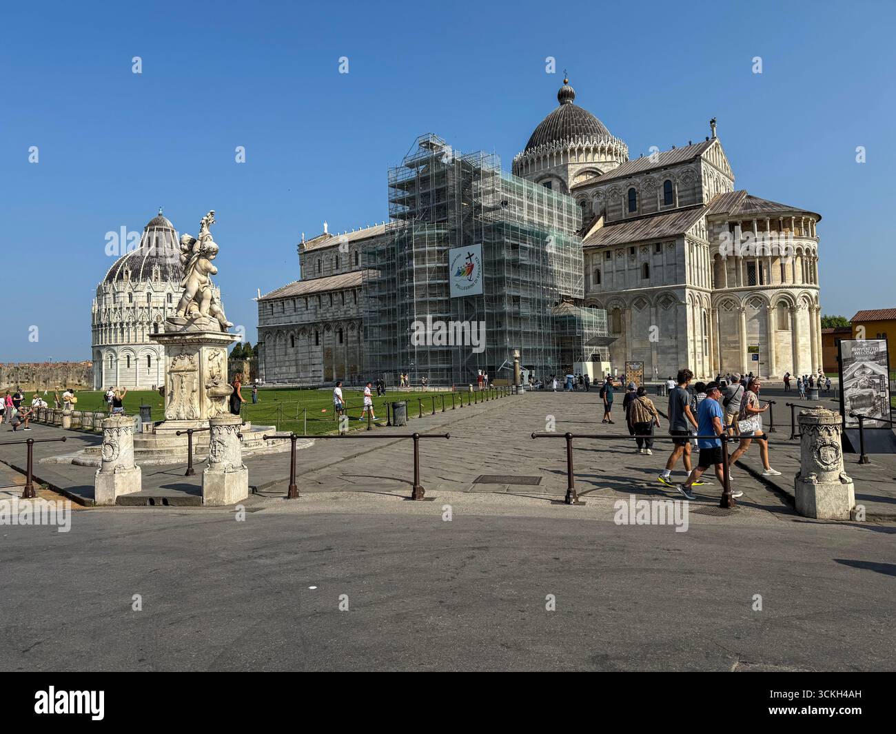 Restoration work being carried out on part of the Cathedral wall in the Piazza del Duomo in Pisa, Tuscany, Italy. - Smartphone Captured Stock Image