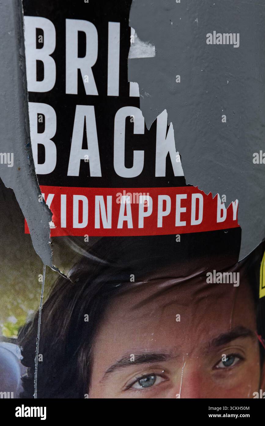 Close-up detail of a torn poster of an Israeli hostage held by Palestinian terrorists in Gaza since the start of the Hamas-Israel war on October 7, 20 Stock Photo