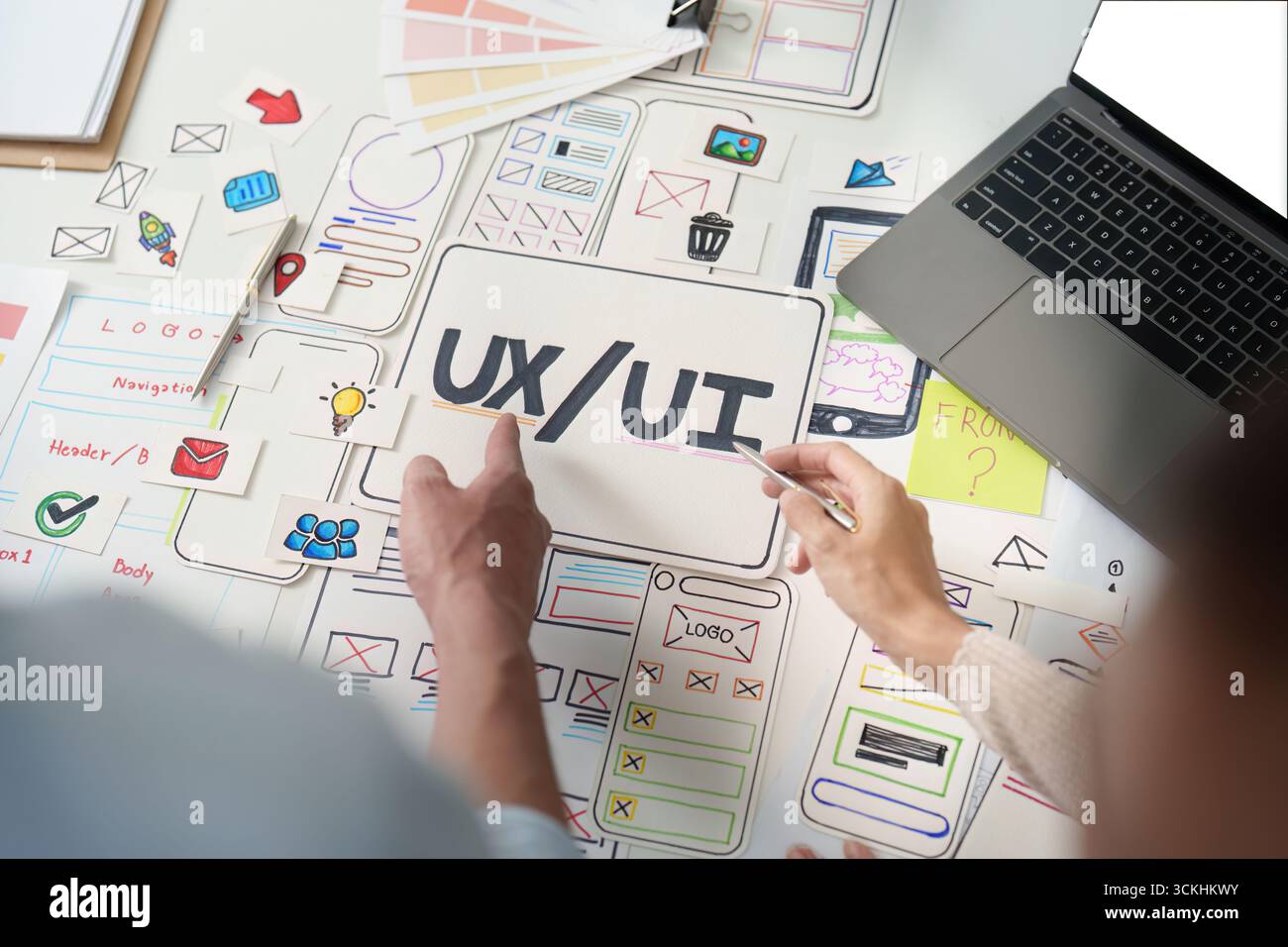 UXUI design brainstorming session with sketches and digital tools Stock Photo