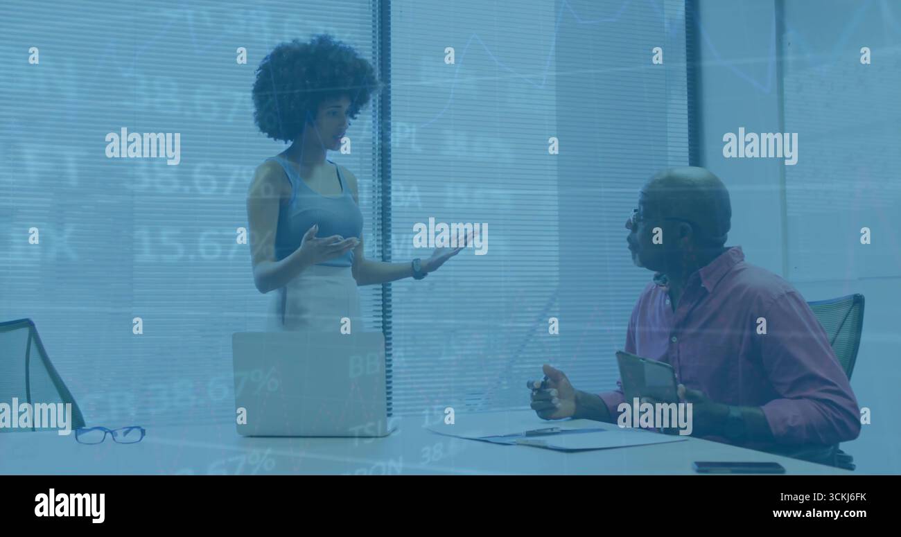 Woman presenting laptop colleague smartphone hi-res stock photography ...