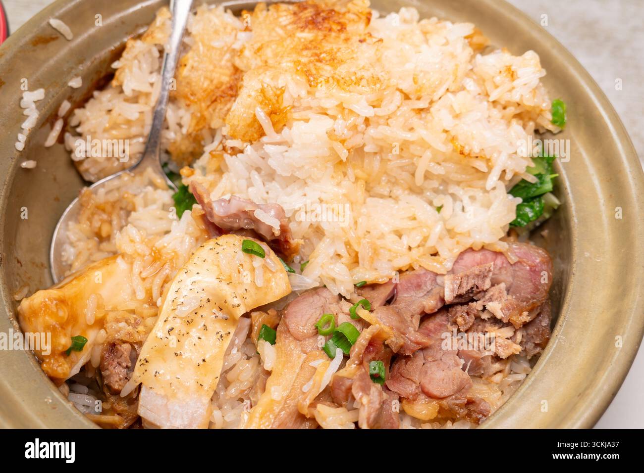 claypot rice with preserved duck and fish belly at horizontal ...