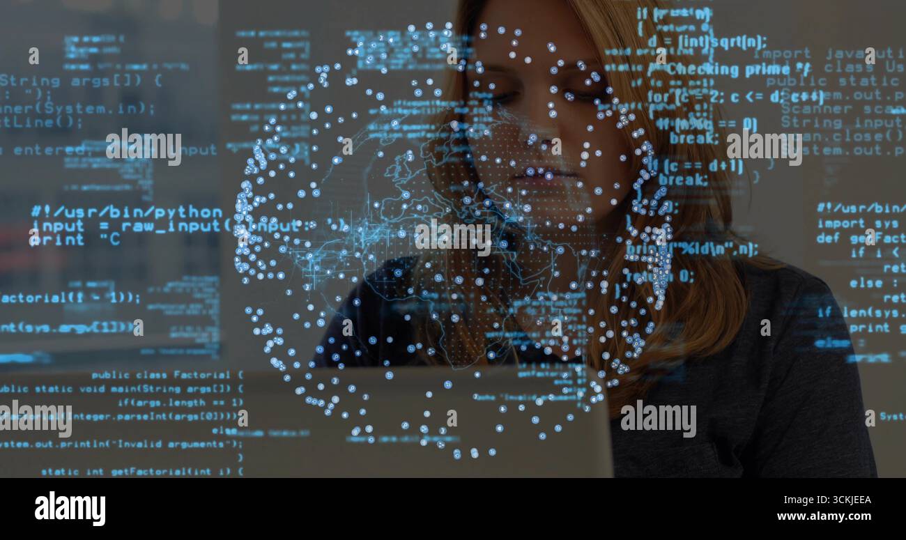 Working software developer coding on laptop in workspace, with blue code data visualization network Stock Photo