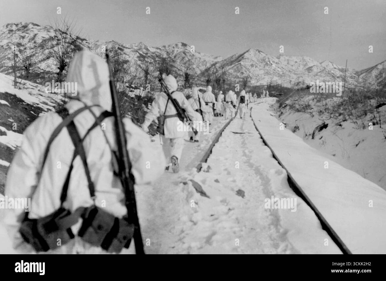 KUMGANGSAN, KOREA - 01 January 1952 - A squad from the US Army 3rd Platoon, Company F, 2d Battalion, 23d Infantry Regiment, 2nd U.S. Infantry Division, moves out from bunker positions on patrol duty at Kumgangsan, Korea during the Korean War - Photo: Geopix/US Army/Hughes Stock Photo