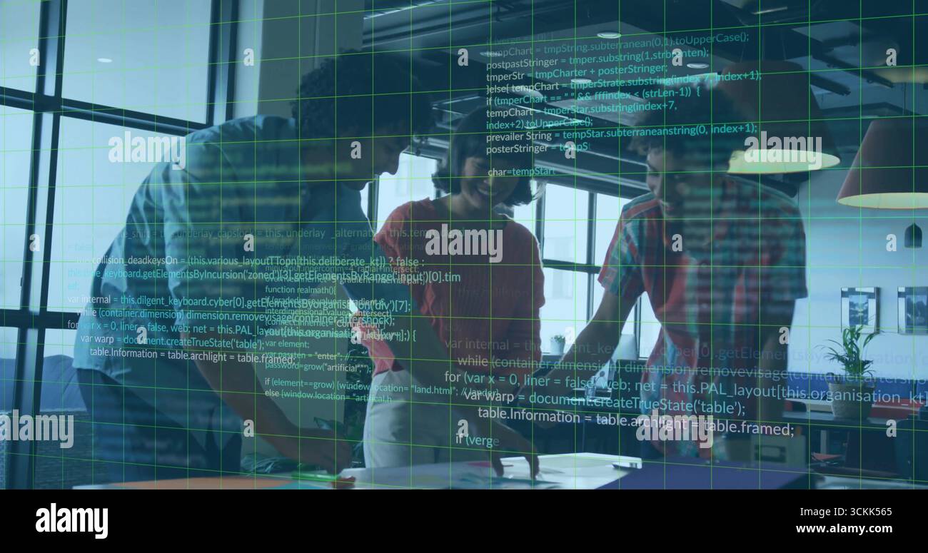 Collaborating professionals leaning over table in sunlit office, with laptops tablet documents Stock Photo