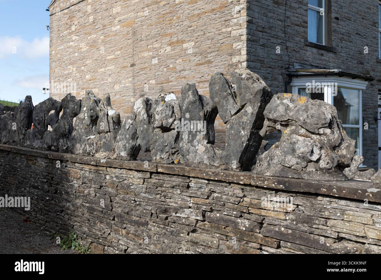 Limestone slabs used as a wall topper in the village of hawes in the Yorkshire Dales Stock Photo