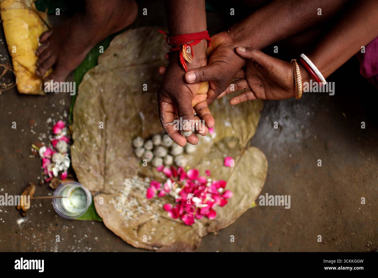 Small Head Ritual Prayagraj, India. 12 Sep.2025. People with shaved heads perform rituals ...
